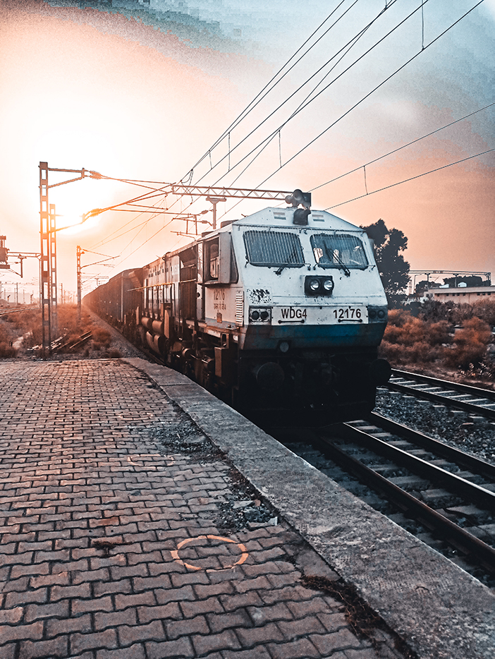 Indian Railways sunset train arriving at platform hd stock image