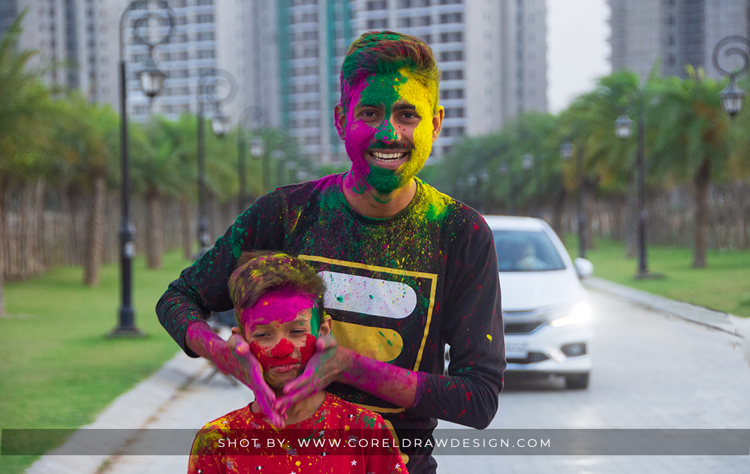 Playing Holi with Younger Brother, Best 2021 Holi Image, colors, HD Royalty Free Stock Photo & Background