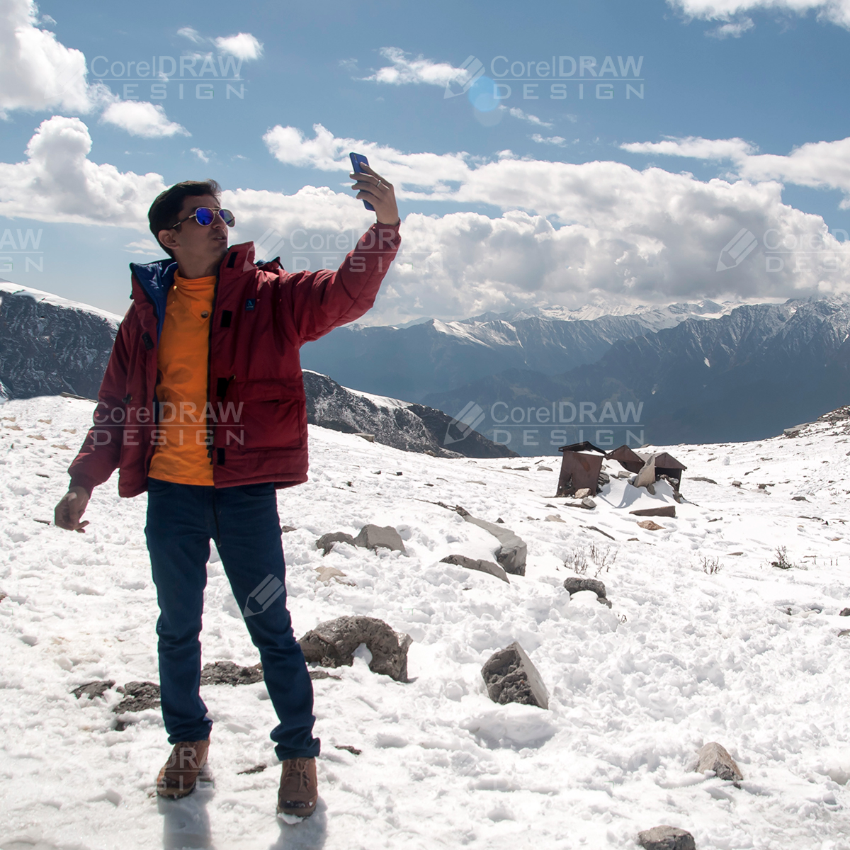 Young Man taking Selfie In Snow Mountain Stock Photos