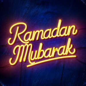 Ramadan Mubarak lettering neon sign stock image
